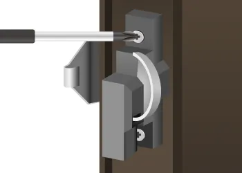 上のビスを外し、新しいクレセント錠の上のビスを仮止めをする